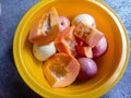 Top view photo of sliced Ã¢â¬â¹Ã¢â¬â¹fruit in a container